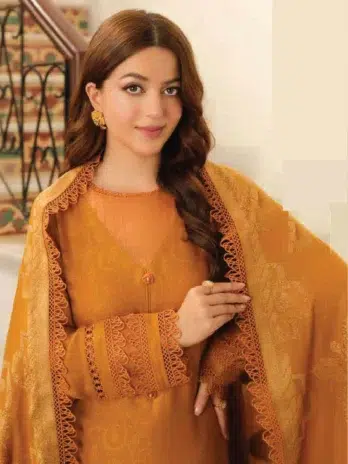 Close-up of the Self Jacquard Leather Peach Shirt and Velvet Jacquard Shawl in Light Brown from Tehzeeb by Riaz Arts.