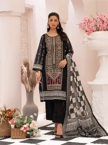 Selena by Zesh Textile SZT-06 - 1 in black color showcasing the dyed embroidered khaddar front with intricate patterns.