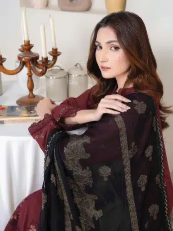 "Close-up of the delicate embroidery on Anadil By Riaz Arts D-03 in Wine color."
