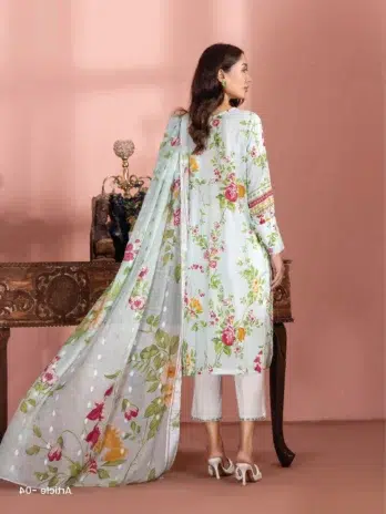 "Model styled in Banafsha by Gulljee D-04 in Light Green color in a serene outdoor setting."