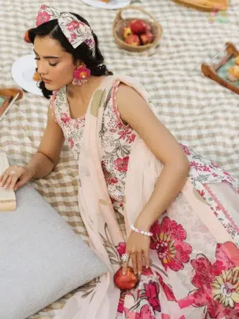 Model wearing full outfit of Cinq Summer Cocktail Florique with chiffon dupatta and embroidered sleeves from Cinq summer collection 2025