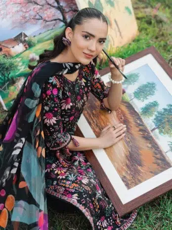 Model wearing full 3-piece Cinq Summer Cocktail Myst suit, featuring embroidered lawn shirt and chiffon dupatta, perfect for Cinq summer collection 2025.