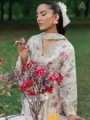 Close-up of Cinq Summer Cocktail Zinnia highlighting embroidery details and fabric texture from Cinq new arrivals in lawn 2025