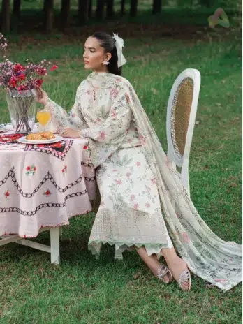 Model wearing full Cinq Summer Cocktail Zinnia 3-piece lawn suit with chiffon dupatta—ideal for Eid and summer wear from Cinq Eid collection 2025