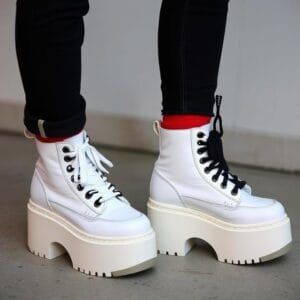 Platform Sneakers or Chunky Boots Think Spice Girls-inspired platforms or Dr. Martens.