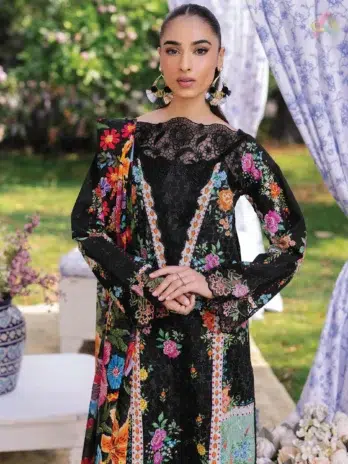 Close-up of embroidered neckline lace and sleeve details