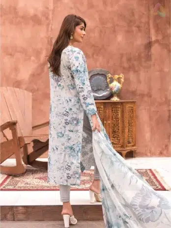 Sanam Saeed by Puri Fabrics D-03 back view shows digitally printed design with embroidered sleeves, styled on a model in natural lighting.