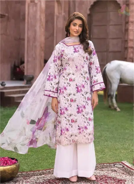 Model wearing Sanam Saeed by Puri Fabrics D-04 front view, highlighting digital printed embroidery and premium lawn fabric with Eid-inspired styling.