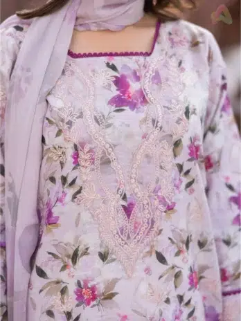 Close-up of Sanam Saeed by Puri Fabrics D-04 embroidery and print work on lawn fabric, capturing thread finesse and seasonal hues.