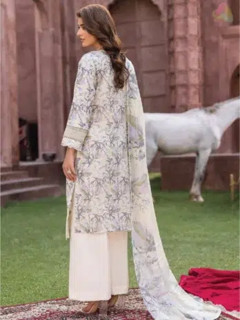 Rear view of Sanam Saeed by Puri Fabrics D-05 with printed back design, modelled in a breezy outdoor setting.