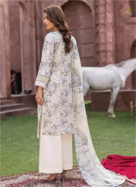Rear view of Sanam Saeed by Puri Fabrics D-05 with printed back design, modelled in a breezy outdoor setting.