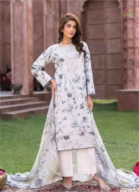 Model wearing Sanam Saeed by Puri Fabrics D-06 showing off its embroidered front with digital prints and festive summer elegance.