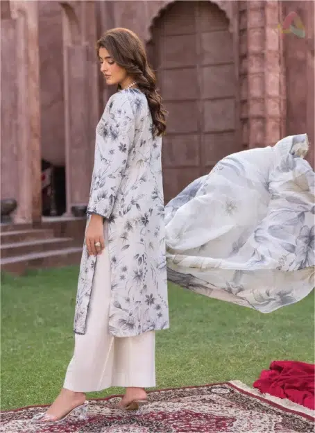 Model displays the digital printed back of Sanam Saeed by Puri Fabrics D-06 in a traditional yet modern setting.
