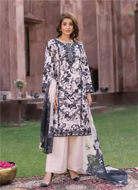 Model wearing Sanam Saeed by Puri Fabrics D-07, showcasing detailed embroidery and digital print on the lawn shirt’s front.