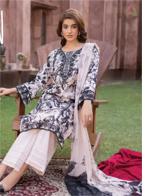 Model dressed in the full Sanam Saeed by Puri Fabrics D-07 ensemble, including shirt, chiffon dupatta, and plain trouser.