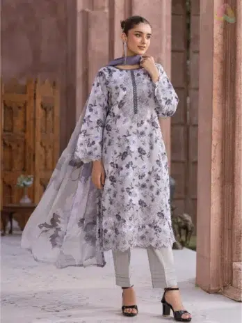 Model wearing Sanam Saeed by Puri Fabrics D-09, showcasing embroidered lawn shirt with digital printed front, ideal for festive and summer gatherings.