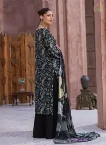The backside of Sanam Saeed by Puri Fabrics D-10 is shown on the model, featuring an intricate digital print across breathable lawn fabric.