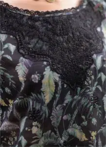 Close-up view of Sanam Saeed by Puri Fabrics D-10 fabric, showing embroidery details and digital print with elegant stitching.