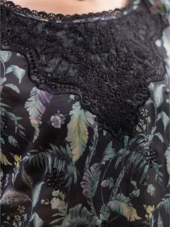 Close-up view of Sanam Saeed by Puri Fabrics D-10 fabric, showing embroidery details and digital print with elegant stitching.