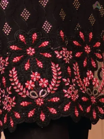 Close-Up Image: Close-up view of embroidery on shirt and cutwork pattern on chiffon dupatta, highlighting DOR’s premium craftsmanship
