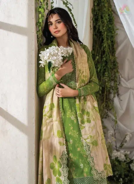 Close-up of Ziya by Binaas D-04 showing the embroidered organza neckline and lace detailing, highlighting the vibrant digital prints