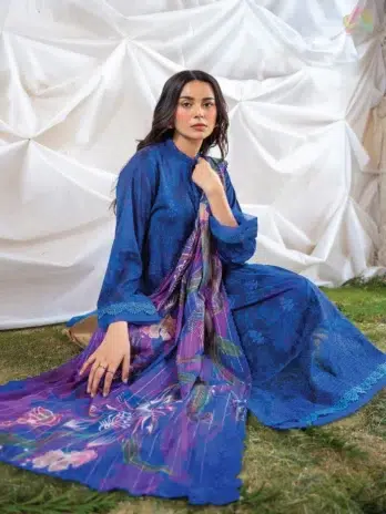 Close-up of Ziya by Binaas D-05 showing the embroidered organza neckline and lace detailing, with vibrant digital prints