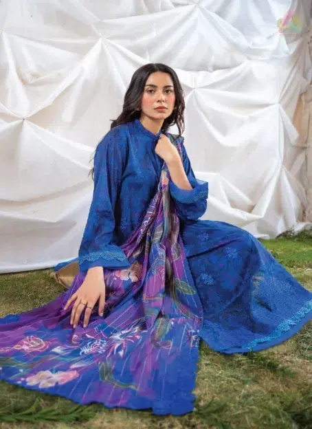 Close-up of Ziya by Binaas D-05 showing the embroidered organza neckline and lace detailing, with vibrant digital prints