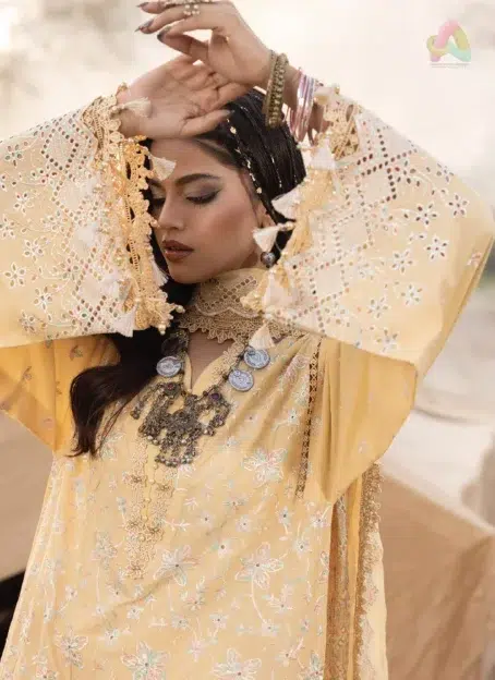Close-up of multi-thread schiffli embroidery on lawn sleeves and neckline, showcasing detailed Adan’s Libas 3030 threadwork and design