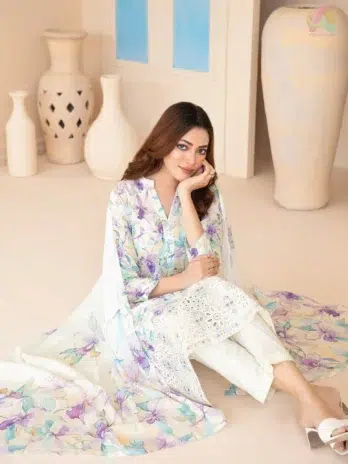 Close-up of Elira by Tawakkal D-3022 embroidery work highlighting fabric texture, color richness, and thread detailing on the lawn shirt