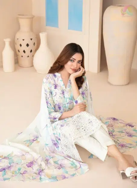 Close-up of Elira by Tawakkal D-3022 embroidery work highlighting fabric texture, color richness, and thread detailing on the lawn shirt