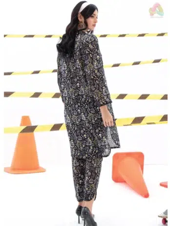 Back view of Identic By Regalia Textile D-04 highlighting cambric shirt’s digital print details and the tailored cut of the cotton trouser.