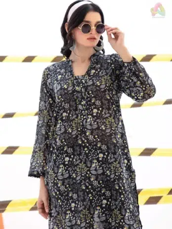 Close-up of Identic By Regalia Textile D-04 fabric showing intricate Airjet digital print details on premium cambric shirt and cotton trouser material.