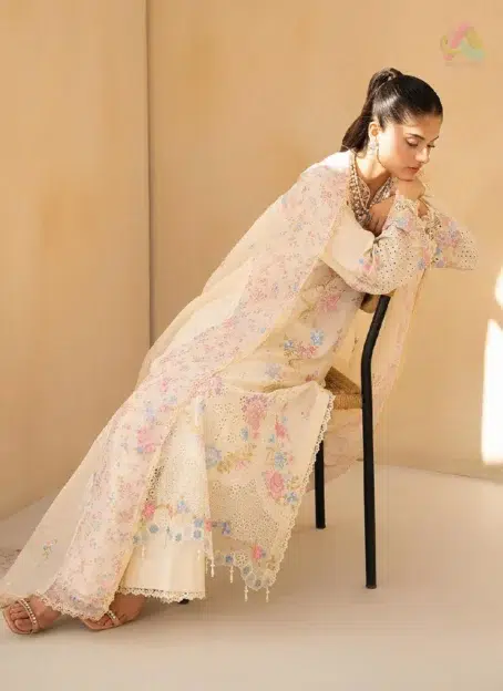 Complete look of Jahaan by Rajbari Aira 2-A 3-piece unstitched lawn suit with embroidered details, net dupatta, and cotton trouser