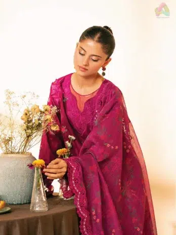 Close-up of Jahaan by Rajbari Maya 4-B embroidery details, 3D motifs, and organza neckline from Rajbari Fabrics summer collection 2025.