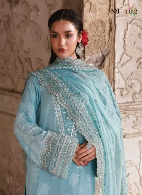 Close-up of Maya Jacquard by Nureh NJ-102 showing fine embroidery on jacquard shirt fabric with detailed chiffon dupatta embellishments.