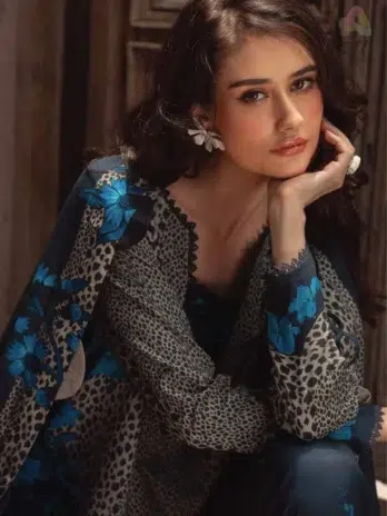 Close-up of C-Print by Charizma CPW5-02, capturing fabric texture, printed shirt design, and the high-quality Irish linen shawl craftsmanship.