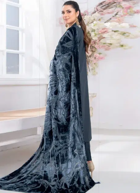 Back view of Pahali by Riaz Arts D-02 highlighting embroidered Dhanak Zari Wool shirt paired with velvet cutwork shawl and plain trouser for winter wear.