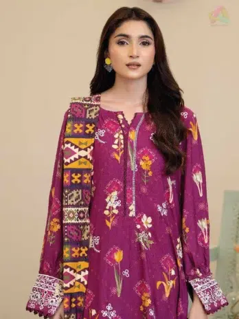 Close-up of Tazeen by Johra JW-170 showcasing embroidery, staple slub fabric detailing, and artistic prints from Johra Fabric Collection.