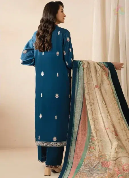 Back view of Zellbury by Al-Rahim Textile D-06 highlighting intricate embroidery on the lawn shirt paired with digital printed monar dupatta and cambric trouser.