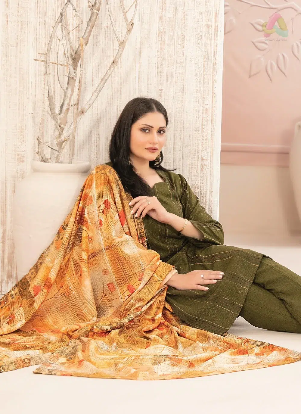 Nazaaha By Tawakkal D-5014 3 Close View: Nazaaha By Tawakkal D-5014 Leather Peach close-up highlighting fancy shirt embroidery and fine fabric quality from Tawakkal clothing.