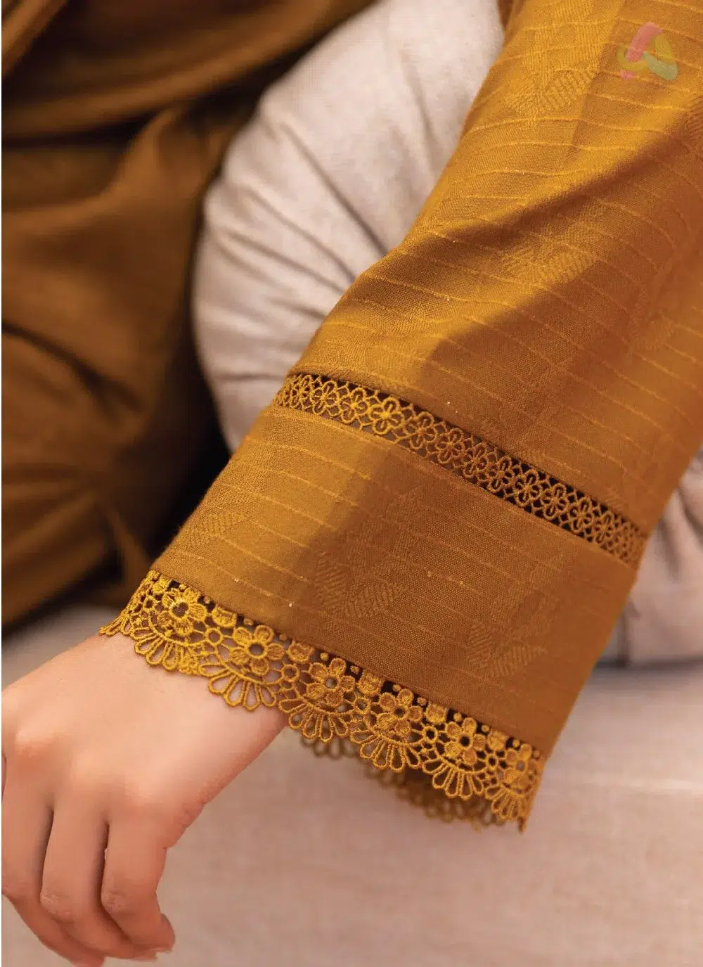 Rang E Mehfil By Mahay Vol 2 D-01 3 Close-up of Rang E Mehfil By Mahay Vol 2 D-01 highlighting velvet jacquard shawl texture and intricate peach shirt design from Mahay clothing.