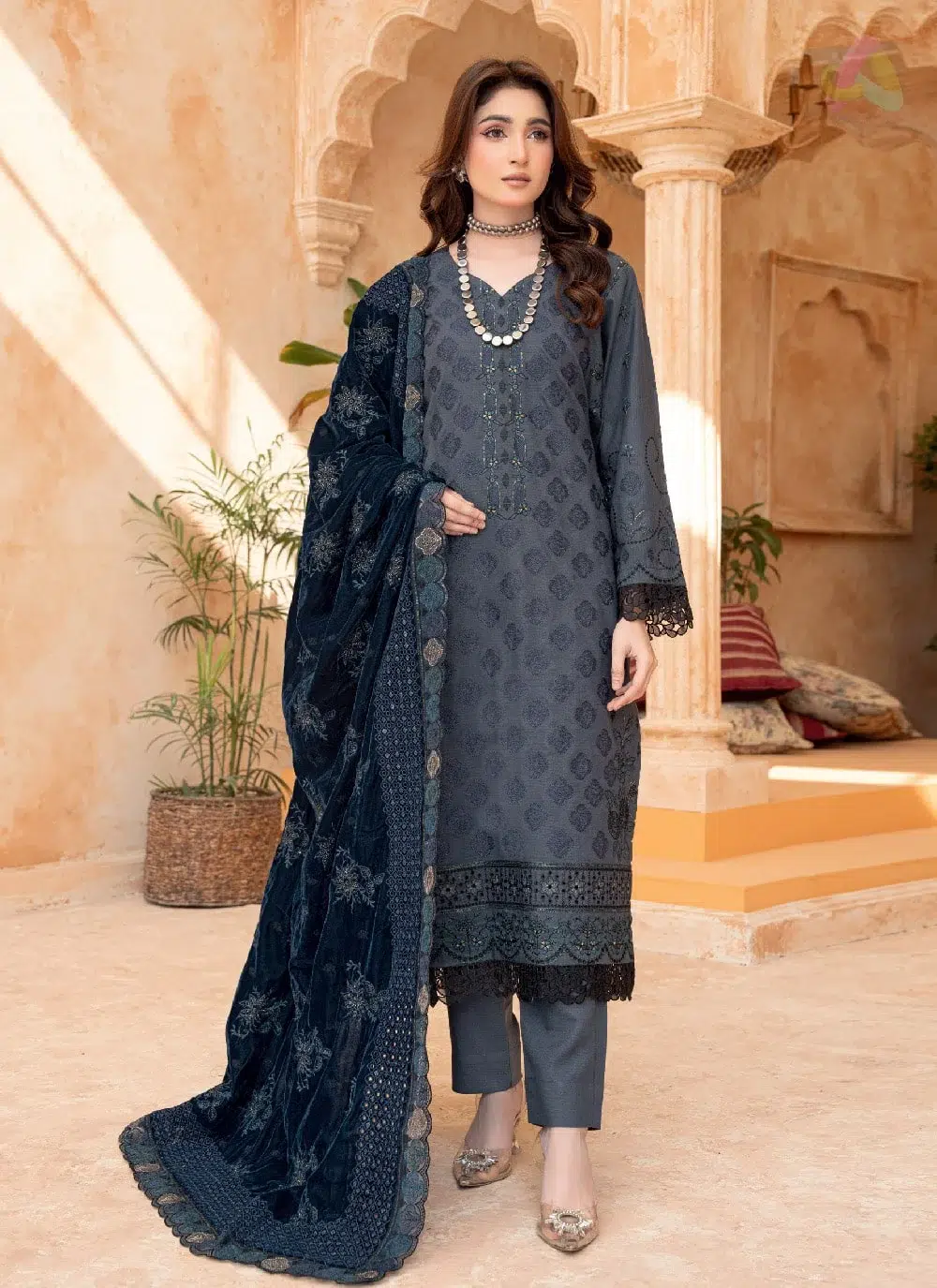 Sang E Mah By Riaz Arts D-02 1 Front view of Sang E Mah By Riaz Arts D-02 showing embroidered peach shirt, micro velvet shawl, and plain trouser in a full 3-piece set.